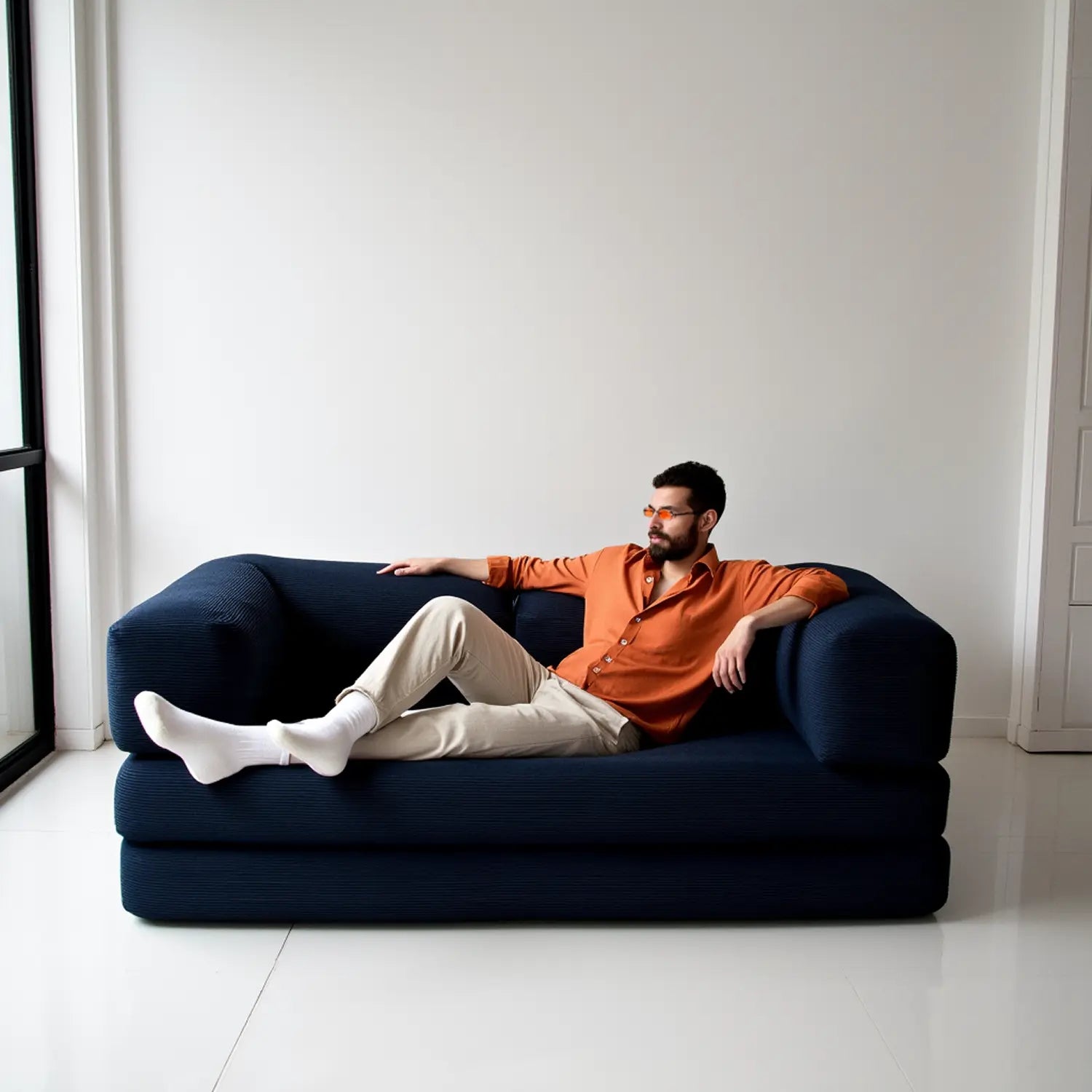 Sofá Cama Bloom - Sofá na Caixa + Apoio de Pé Bloom Tecido Boucle Azul