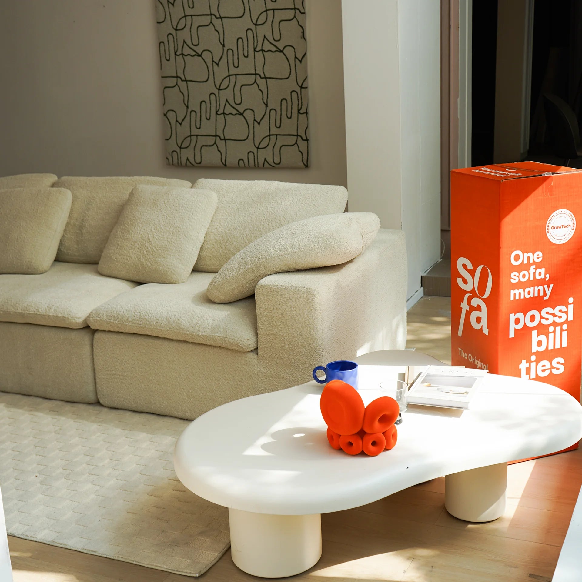 Sofá na Caixa modular Sienna 3 lugares em Boucle com Apoio - Bege Areia