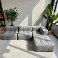 Sofá na Caixa modular 4 lugares em Boucle com 1 chaise - Cinza · detalhe na cor cinza · vista 4